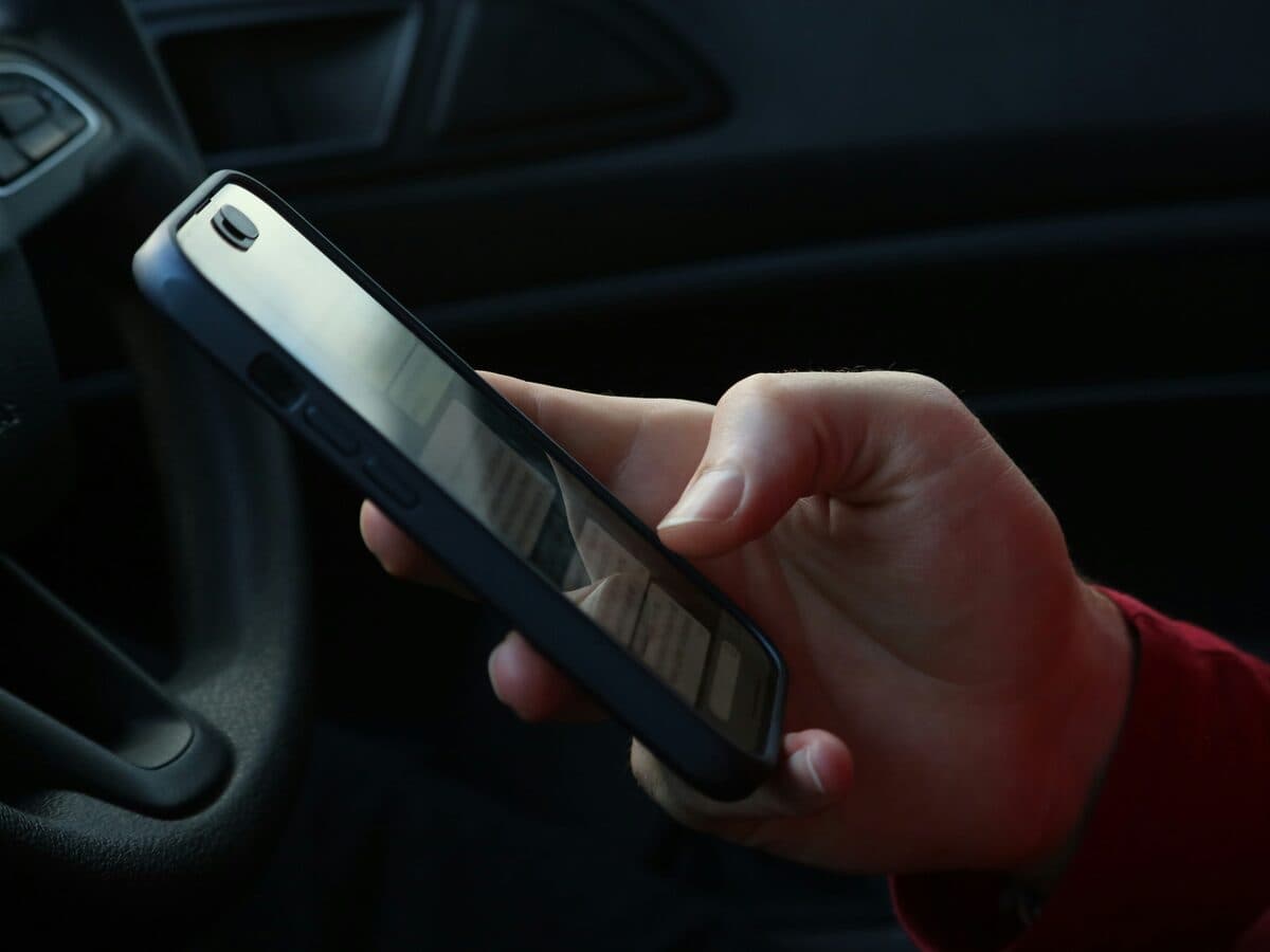 Getting an instant online cash offer for a used car on a phone